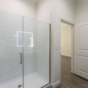 Designer Bathroom Suites with a shower