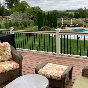 Elevated composite deck with outdoor furniture.