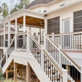 Composite deck with stairs, lighting and railings.