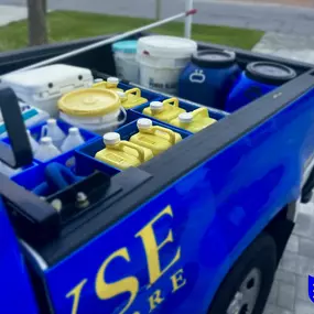 Swym Wyse Pool Cleaning car with pool cleaning and maintenance products