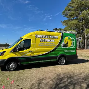 Coastal Home Services, Inc. - HVAC, Plumbing, and Electrical yellow work van