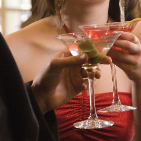 Couple enjoying drinks at Le Cabaret Lounge in Paris Las Vegas.