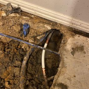 slab leak repair photo below floor