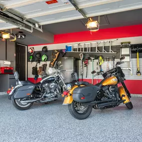 Storage and organization might seem boring, but your garage doesn't have to be! This York, PA garage has fun accents anchored by a cool gray and black color scheme tied together with an epoxy floor to help keep this family organized and stylish!