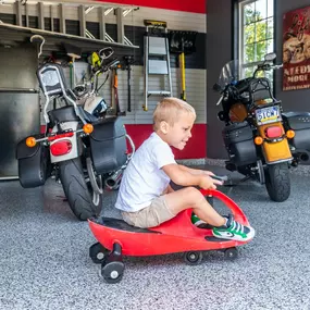 Playtime is more fun on a polyaspartic epoxy floor! Get the floor, and garage, you’ve been dreaming about by contacting PremierGarage of Lancaster today.