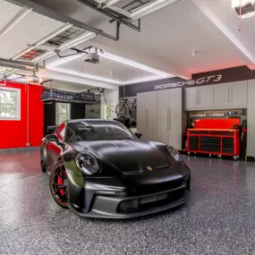 The garage of your dreams needs more than a cool car. Get your garage organized in Lancaster, PA by calling PremierGarage of Lancaster. Our custom garage cabinets, durable epoxy flooring, and overhead garage storage are just what you need to get your garage in gear!