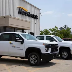 lineup of trucks, vans, pick-up trucks and trailers