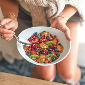 Vegan & Gluten-Free Treat • Overnight Oats topped with pomegranate seeds, strawberry, blueberry, kiwi, vegan gf granola, and almond butter