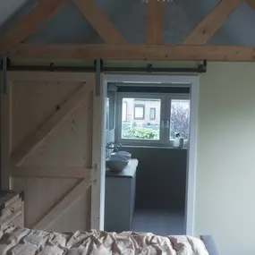 Slaapkamer met badkamer