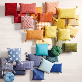 Plush chenille throw pillows, adding texture and warmth to sofas, beds, or accent chairs with its luxurious fabric.
