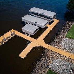 Canopies For Boat Lifts: FLOE boat lift canopies offer greater boat protection than competitors’ lifts with their extra deep fabric and framework. Your canopy will not blow in or up and will keep your boat fully covered.