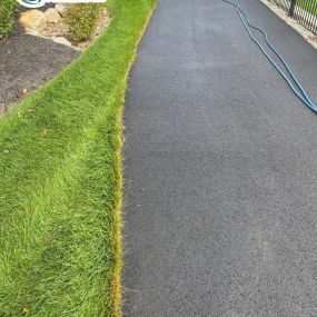 clean concrete road after power washing service in allentown pa