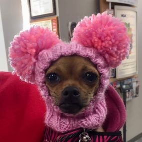 Showing off her hat!  Dressed up for mani-pedi appointment