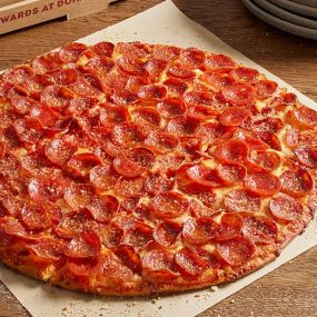 Loaded Edge to Edge® with crispy family recipe pepperoni and aged smoked Provolone, Romano. There are 100 pieces of pepperoni on every large Famous Thin Crust Pepperoni Pizza!