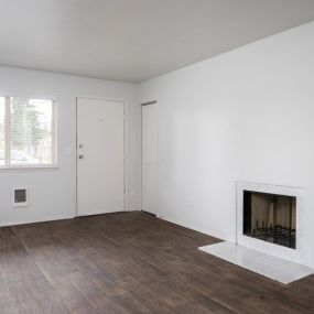 Cozy up in front of the fireplace in the living rooms at Kentwood Apts. in Kent, WA!