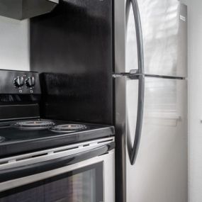 Stinless steel efficient appliances adorn the kitchens at Kent wood Apts. in Kent, WA