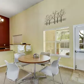 a kitchen with a counter top and a refrigerator