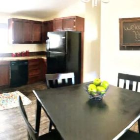 a view of the kitchen and dining room from the living room