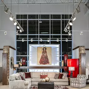 Sophisticated living room furniture display with bold artistic accents.