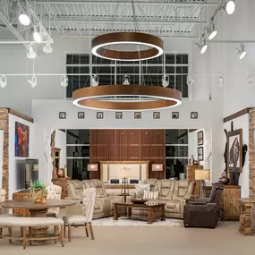 Warm and inviting furniture showroom with rustic accents.