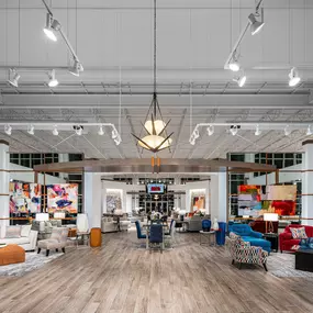 Spacious showroom at Rooms To Go Pearland, TX, showcasing vibrant and modern furniture collections.