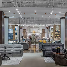 Modern showroom featuring various seating and decor options.