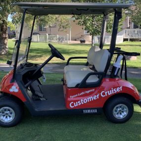 The Tyson Luthi State Farm golf cart!