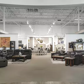 Spacious interior showcasing a variety of home furniture displays.