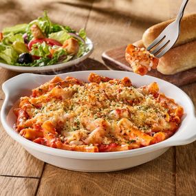 Five Cheese Ziti al Forno: Oven baked blend of Italian cheeses, pasta and our signature homemade five cheese marinara.