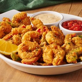 Shrimp Fritto Misto: Over a half pound of shrimp mixed with onions and bell peppers, hand breaded and lightly fried. Served with marinara and spicy ranch.