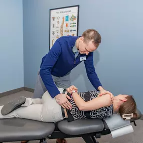 Dr. Krizo doing a spinal adjustment