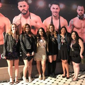 Group Of Women At Male Review Bachelorette Party
