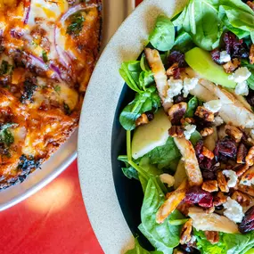 Fresh Spinach, Grilled Chicken Breast, Crisp Sliced Apples, Feta, Topped with Candied Pecans & Dried Sweet Cranberries. Served with a Side of Apple Cider Vinaigrette.