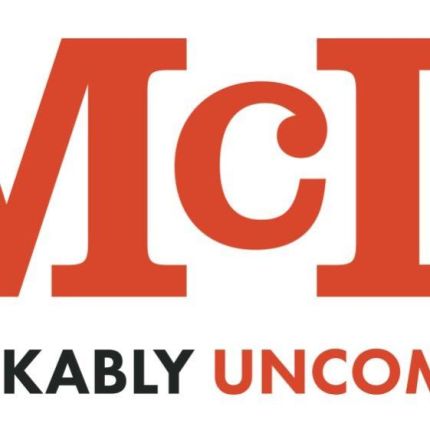 Logotyp från McDaniels Marketing
