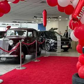 Interior of MG Grantham Dealership with Balloon Arch