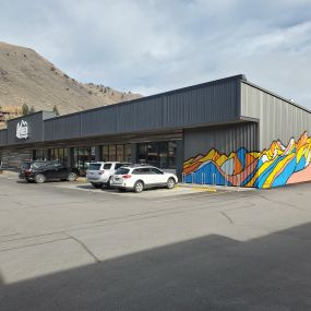 Side angle of the REI Jackson Hole Store - View of a beautiful mountain mural