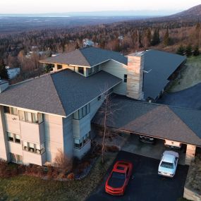 Reds Roofing provides luxury home roof repair and improvements in Eagle River, Alaska.