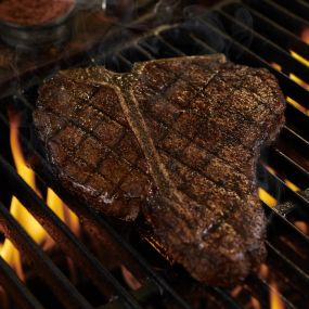 Got the biggest steak in the game wearing our name! The LongHorn porterhouse combines a bone-in strip and tender filet in one thick cut