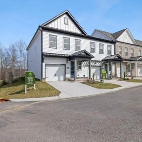 a row of newly-built homes with fresh paint