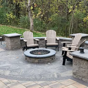 Transform your fireplace into a focal point with Richbergs Landscape's exquisite pavers. Elevate your outdoor living space with style and functionality. Contact us to bring your vision to life!