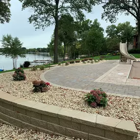 Enhance your outdoor aesthetics with Richbergs Landscape's versatile retaining wall solutions. Let's add depth and dimension to your landscape with our expert craftsmanship. Connect with us today!