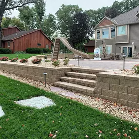 Maximize your property's potential with Richbergs Landscape's sturdy retaining walls. From terraces to raised flower beds, we'll design solutions that elevate your landscape. Contact us today!