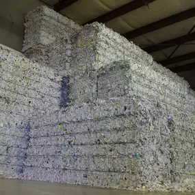 Shredded paper bales at Absolute Data Shredding. We provide NAID AAA Certified paper shredding, hard drive destruction, and electronics recycling services in Oklahoma City and Tulsa, OK.