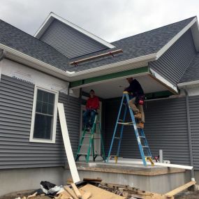 New Vinyl siding and Gutters