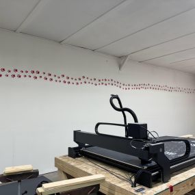 CNC router table cutting out all of our kennels, signage and artwork. Dog got loose and left prints all over the walls.