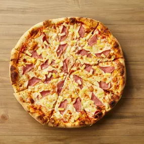 HAWAIIAN LUAU PIZZA Canadian bacon & pineapple.