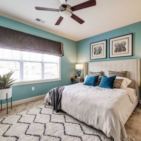 Bedroom with turquoise walls