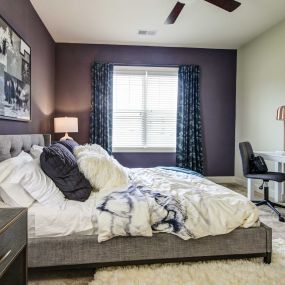 Bedroom with purple walls