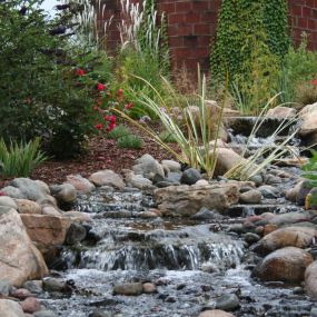 Adding a water feature to your landscape design is a great way to invite the feeling of peace and relaxation into your property. Not only does the sound of flowing water attract wildlife and add curb appeal, but it also reduces noise pollution and enhances air quality. Call the professionals at Spear’s Landscape today to get started on your custom design.