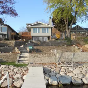 Looking to add dimension and functionality to your outdoor space? Retaining walls and stone steps can provide structural support and create visual interest to help you make the most of your yard. Whether you're looking to level out a sloped lawn, create a garden bed, or add definition to your landscaping, retaining walls and steps can be customized to fit your specific needs and style.